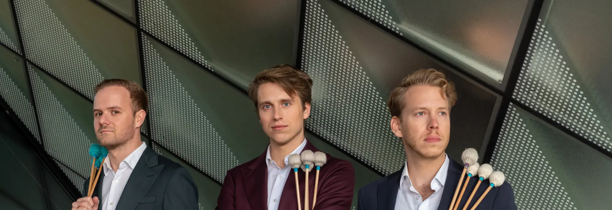 TrioColores holding mallets